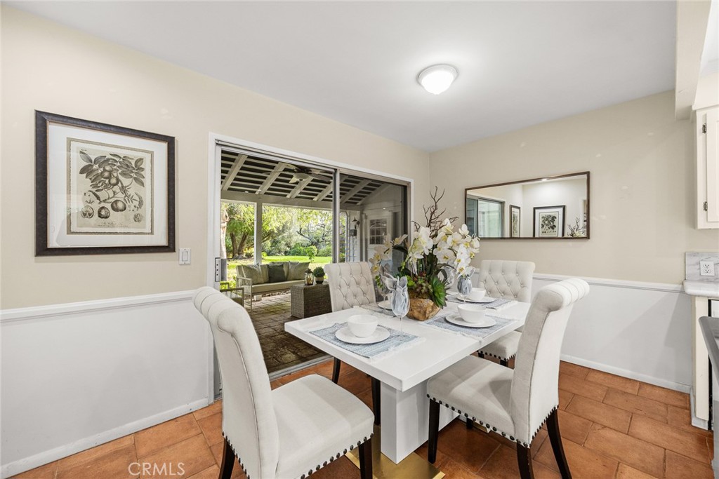 1110 Fallen Leaf Road Arcadia, CA 91006 - Photo 14 of 38 a view of a dining room with furniture window and wooden floor