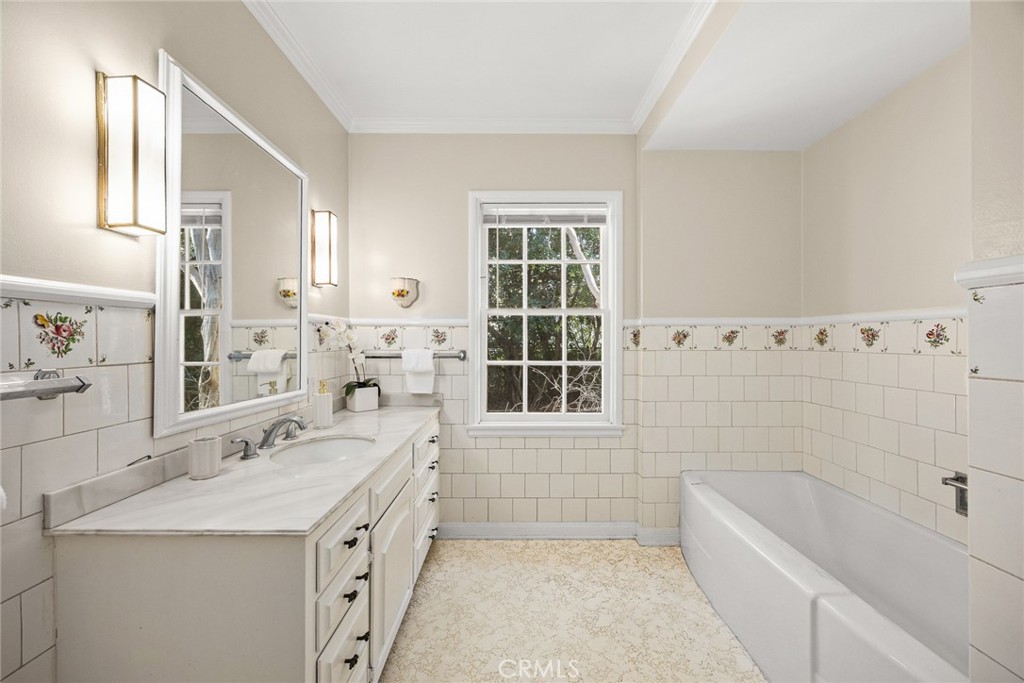 1110 Fallen Leaf Road Arcadia, CA 91006 - Photo 20 of 38 a bathroom with a tub sink and window