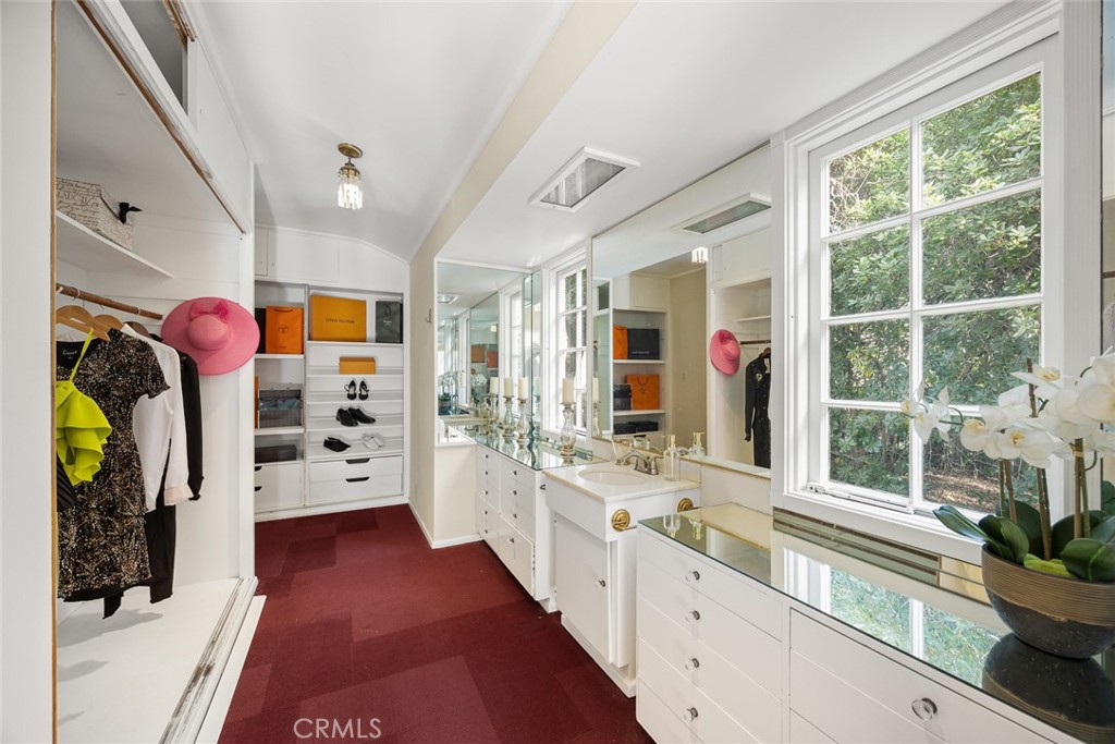 1110 Fallen Leaf Road Arcadia, CA 91006 - Photo 21 of 38 a large white kitchen with stainless steel appliances granite countertop a refrigerator and a stove