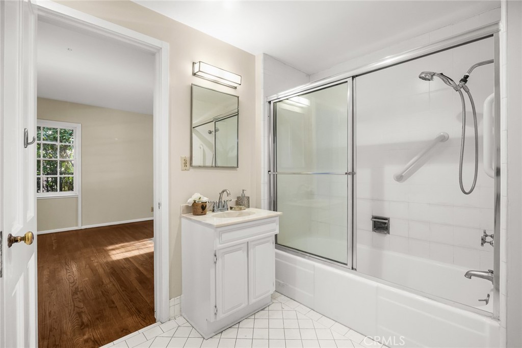 1110 Fallen Leaf Road Arcadia, CA 91006 - Photo 25 of 38 a bathroom with a bathtub shower sink vanity and mirror