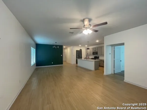 a view of a kitchen with a sink and a kitchen