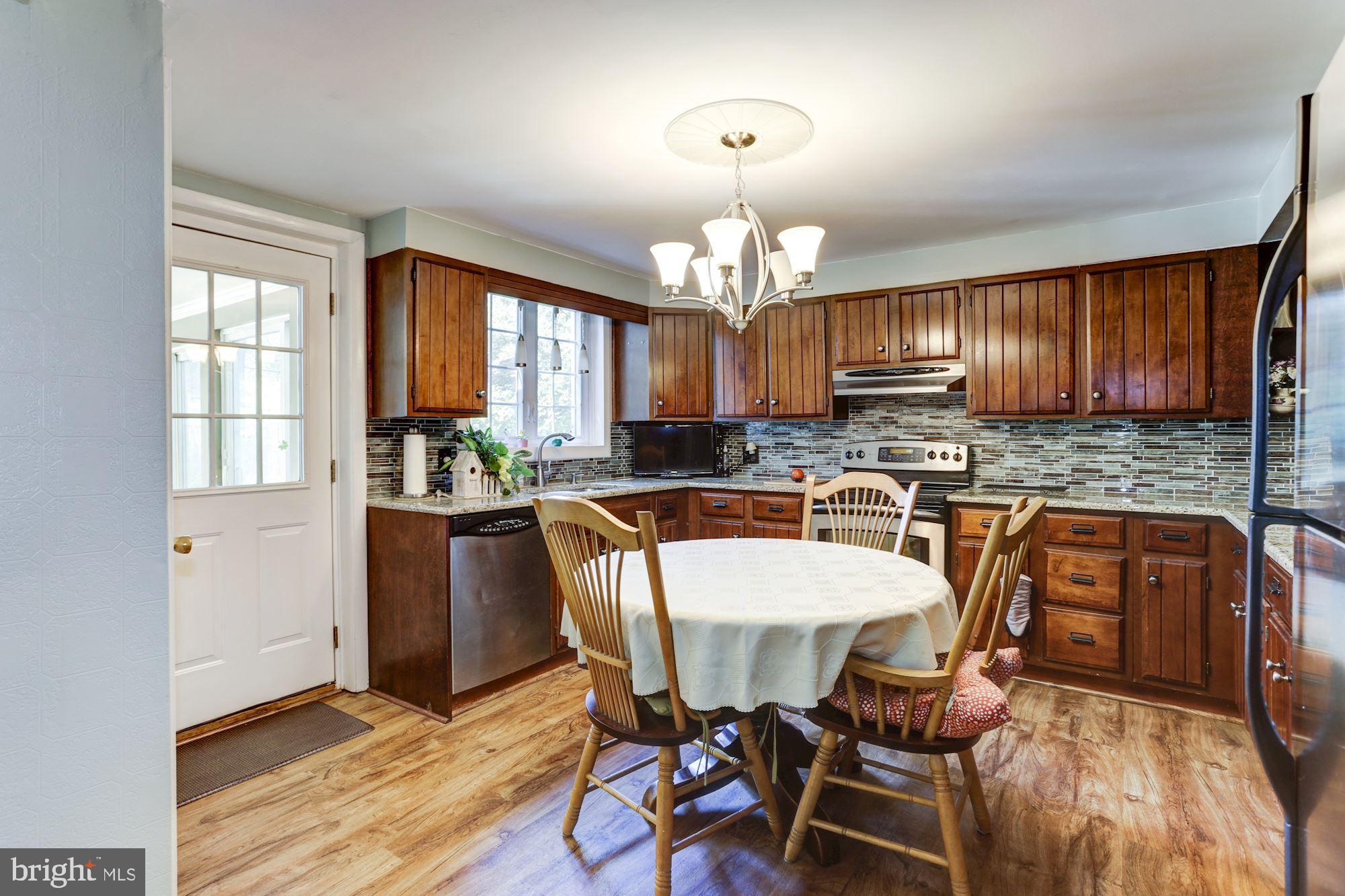 1531 Long Point Road Pasadena, MD 21122 - Photo 12 of 33 Updated Kitchen W/ walkout to 3 Seasons Room!