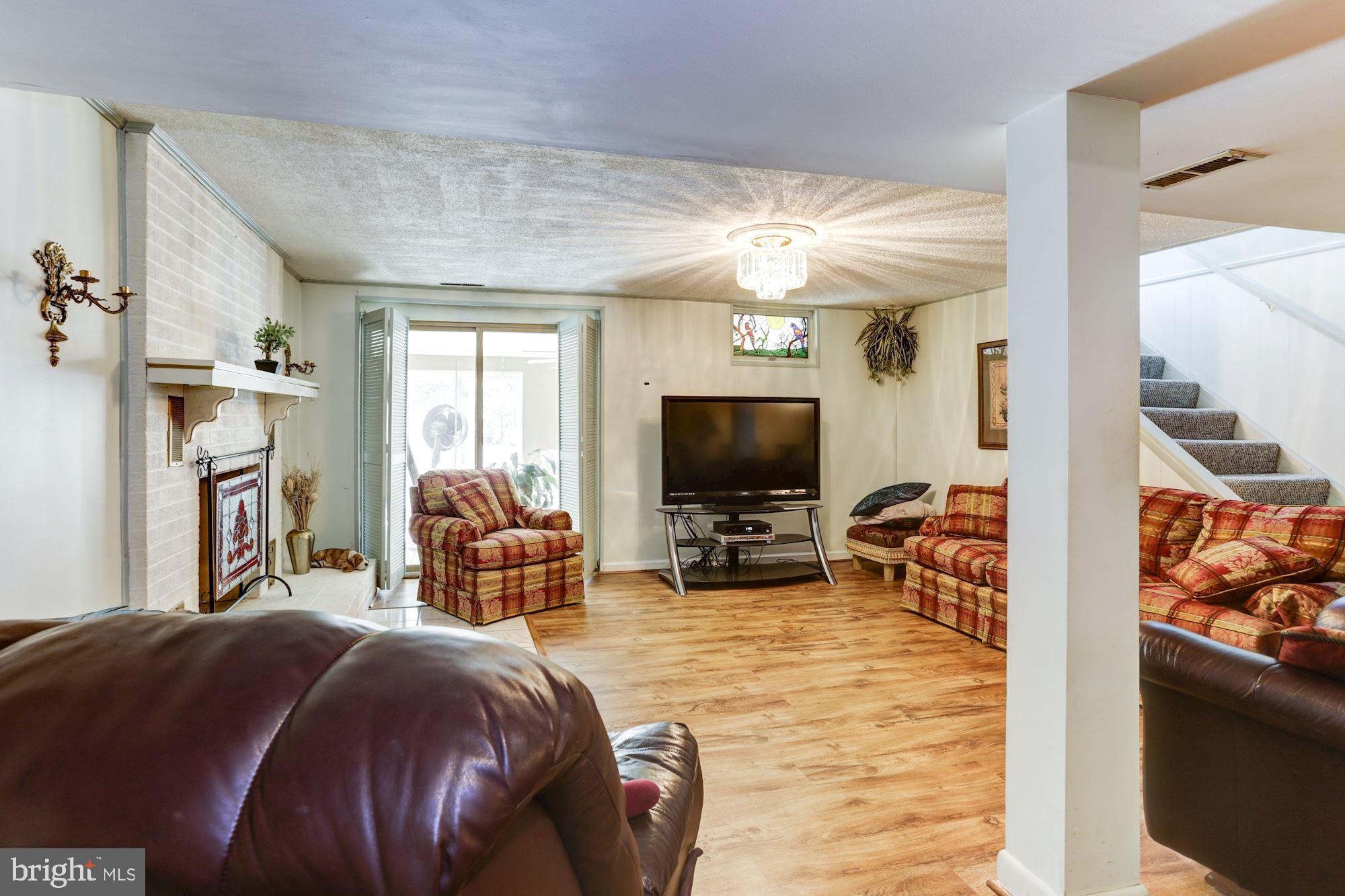 1531 Long Point Road Pasadena, MD 21122 - Photo 14 of 33 Large L.L Family room with Walk out!