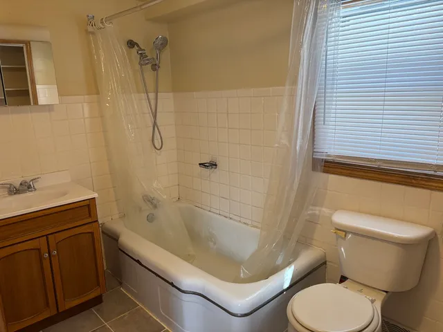 a bathroom with a sink and a toilet