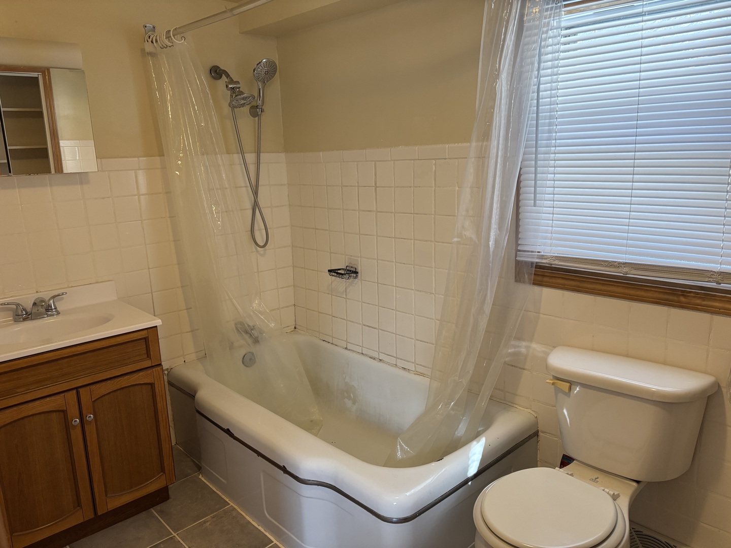 917 Johnson Street Streator, IL 61364 - Photo 14 of 17 a bathroom with a sink and a toilet