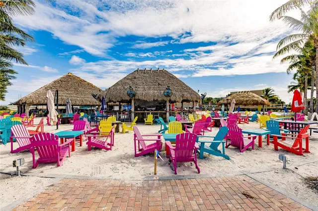 a view of swimming pool with sitting area
