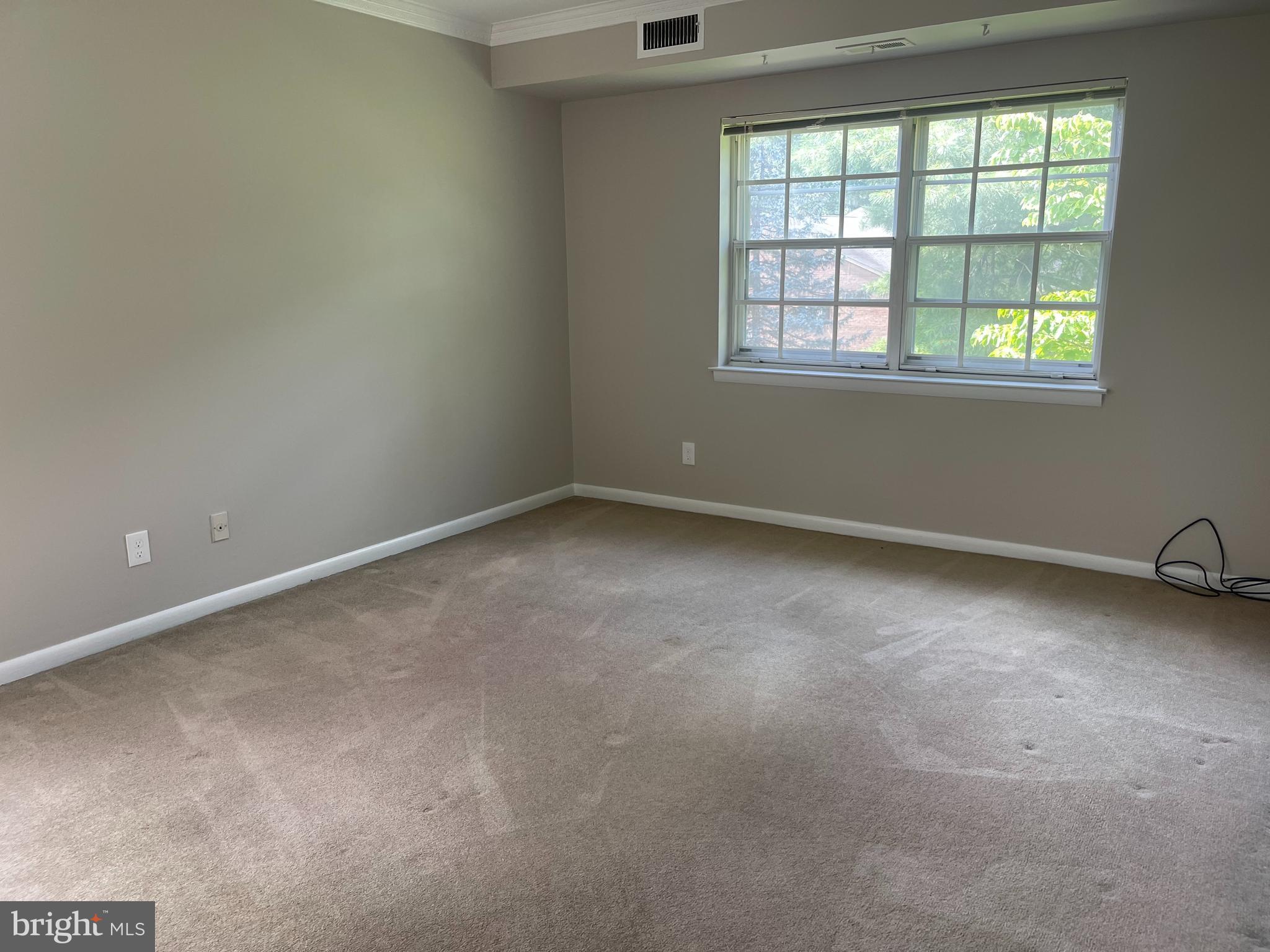 247 Old Forge Crossing, Unit 247 Devon, PA 19333 - Photo 7 of 10 an empty room with a window