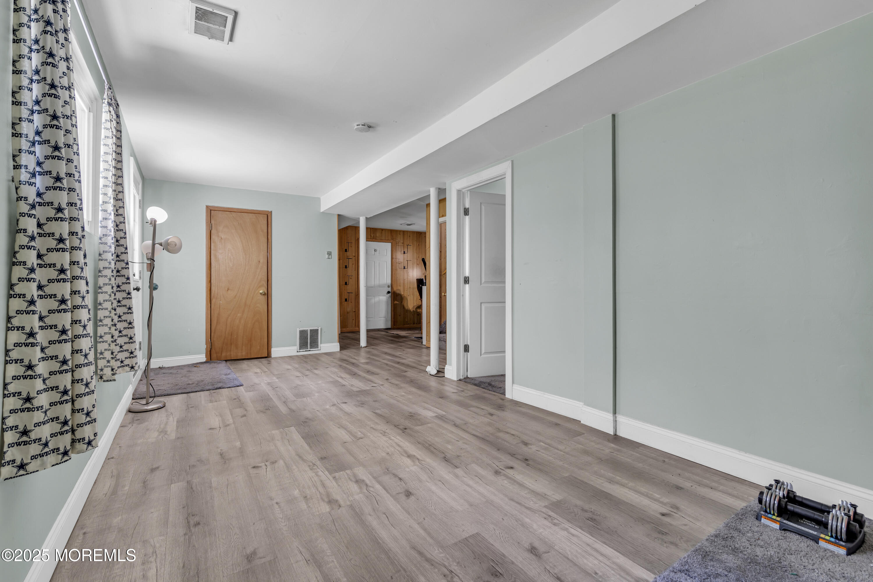 47 Beam Avenue Jackson, NJ 08527 - Photo 21 of 30 wooden floor and windows in a room