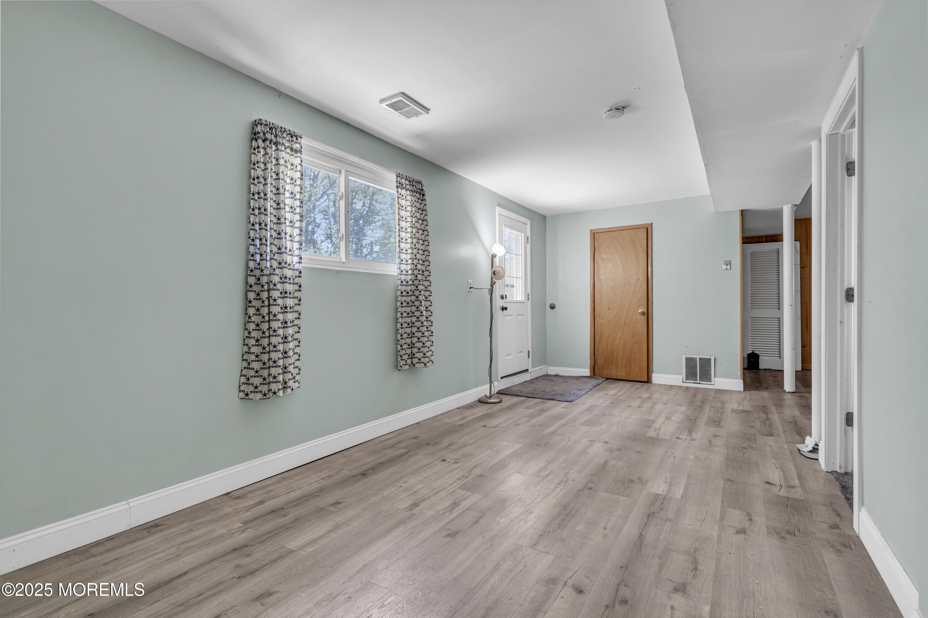 47 Beam Avenue Jackson, NJ 08527 - Photo 22 of 30 wooden floor in an empty room with a window