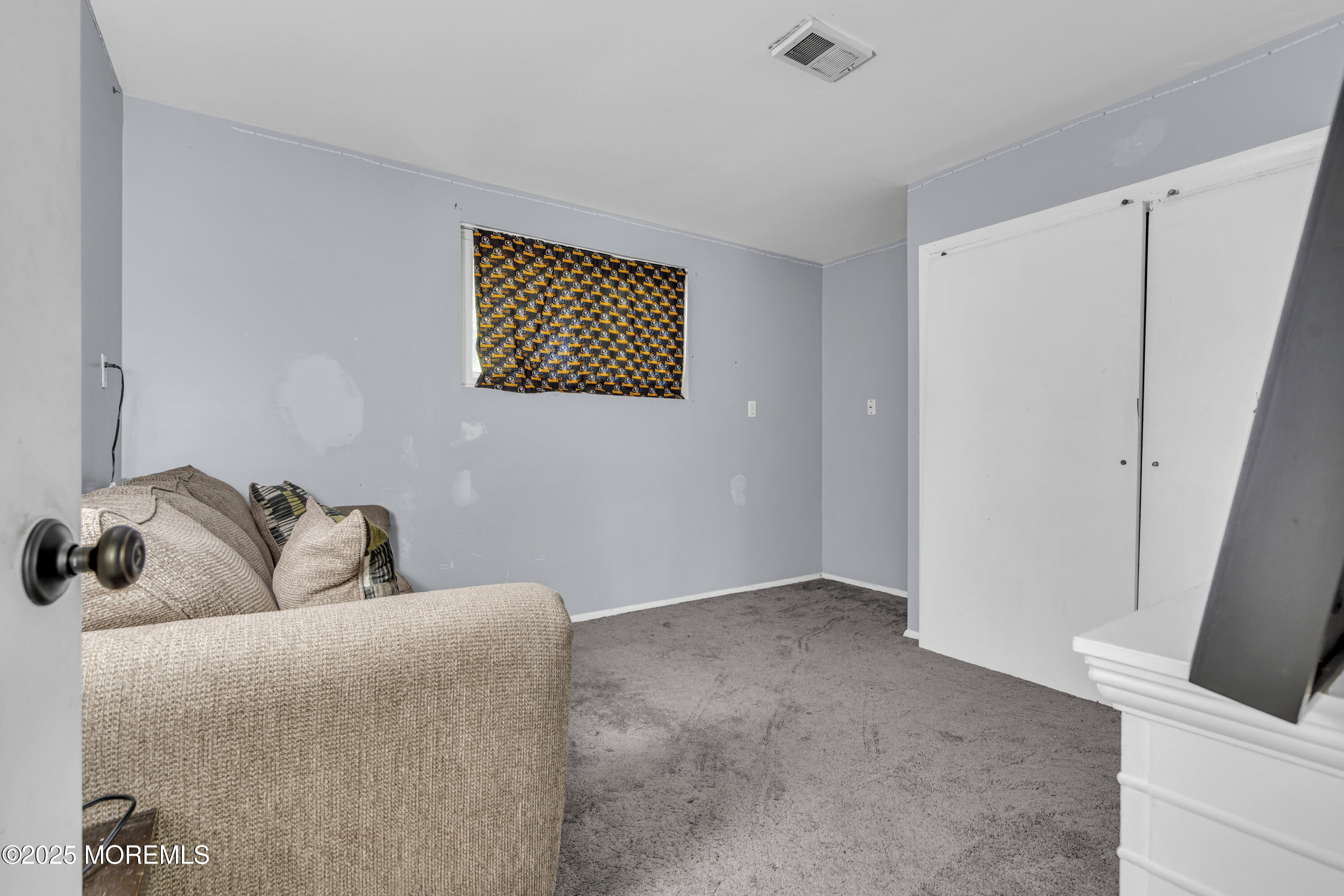 47 Beam Avenue Jackson, NJ 08527 - Photo 23 of 30 a bedroom with a bed and a window