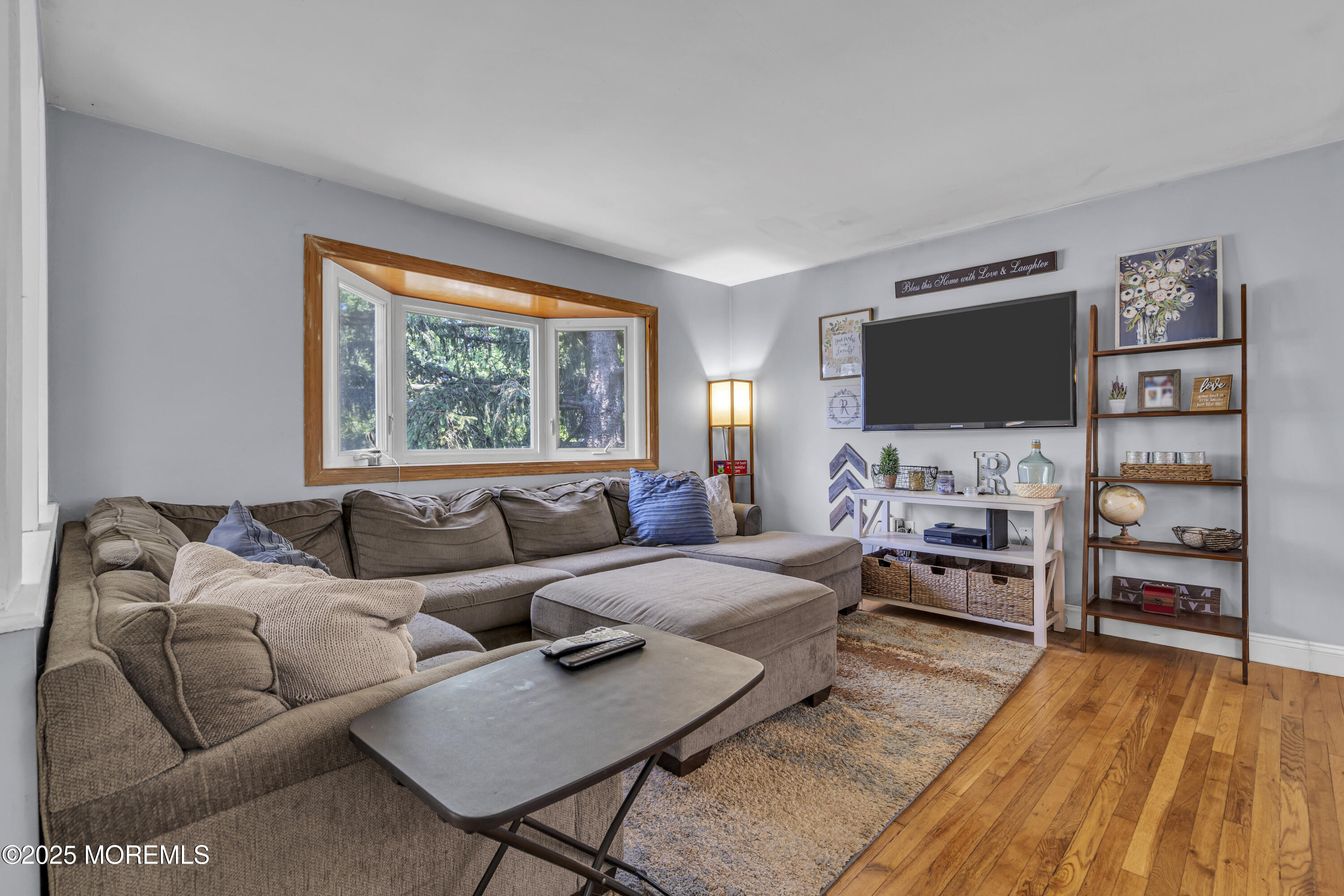 47 Beam Avenue Jackson, NJ 08527 - Photo 6 of 30 a living room with furniture and a flat screen tv