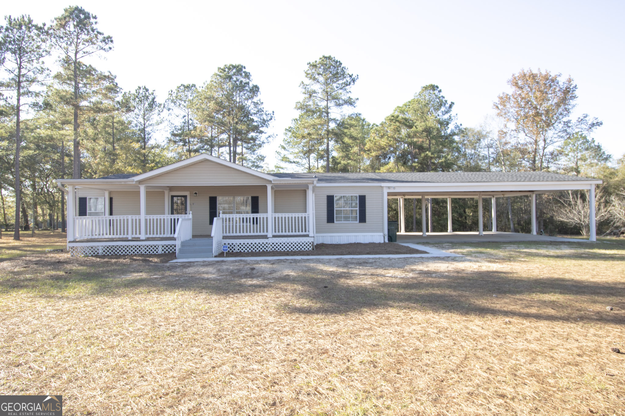 100 Sandstone Place Metter, GA 30439 - Photo 1 of 1 a front view of a house with a yard