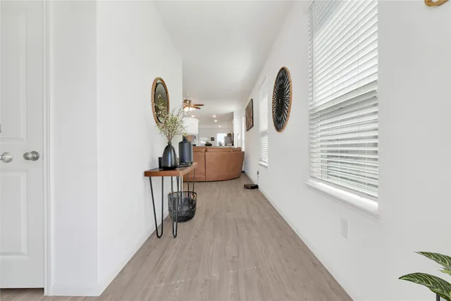 a view of entryway with wooden floor