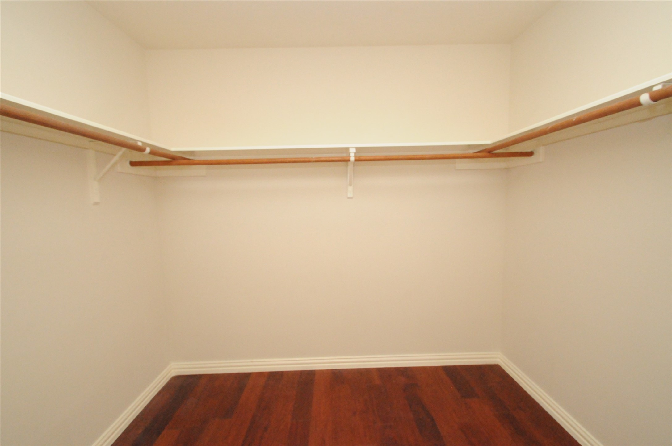 16127 Eaglewood Spring Court Houston, TX 77083 - Photo 18 of 31 a view of small space with racks on the wall