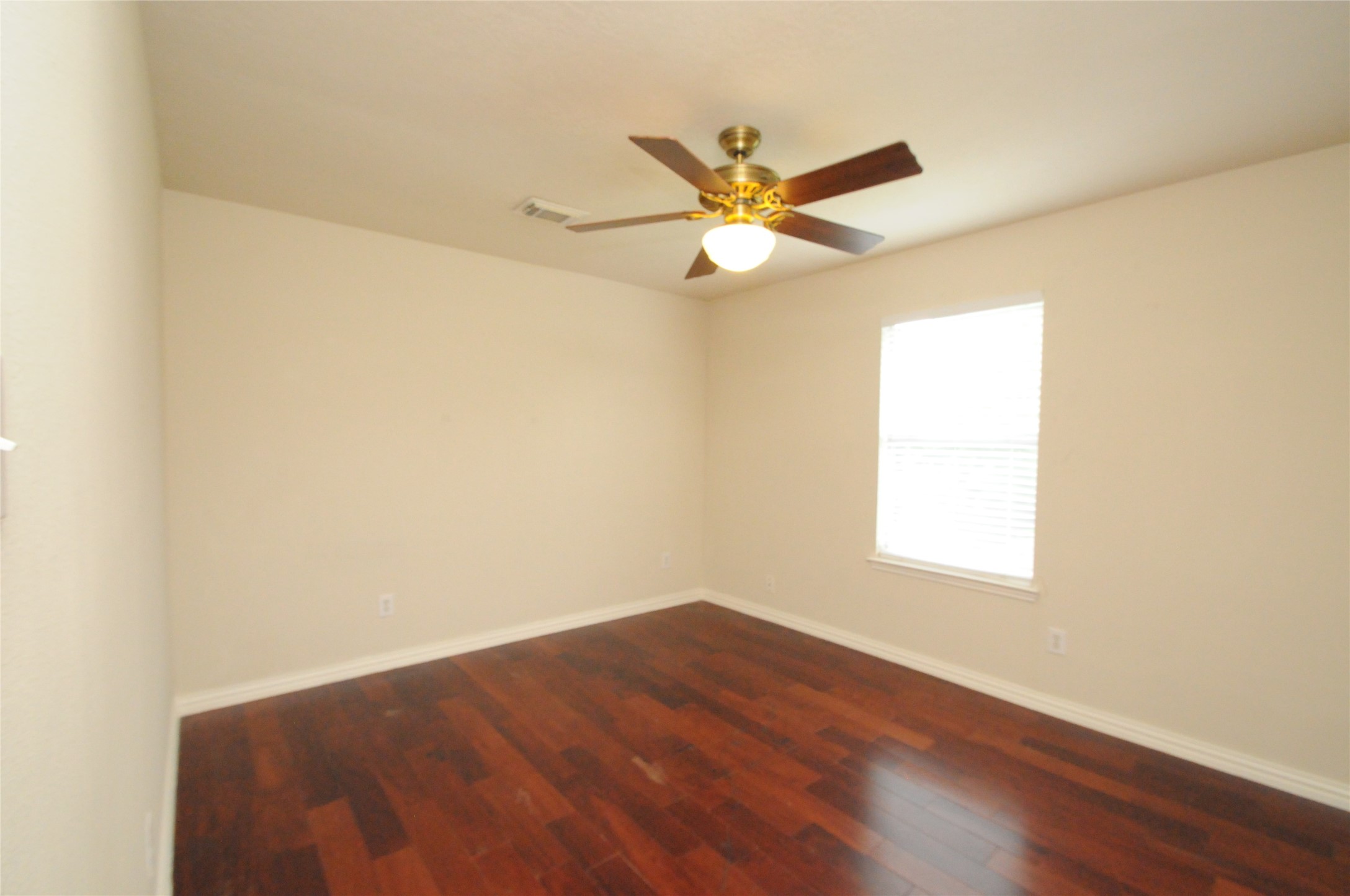 16127 Eaglewood Spring Court Houston, TX 77083 - Photo 24 of 31 wooden floor in an empty room