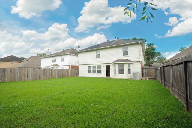 a view of a yard in front of house