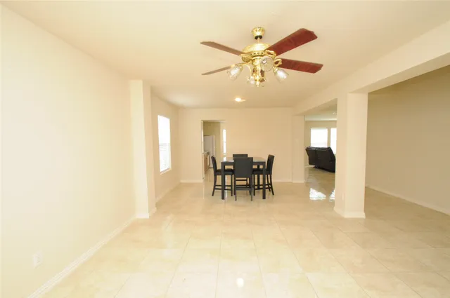 a view of a livingroom with furniture and a chandelier