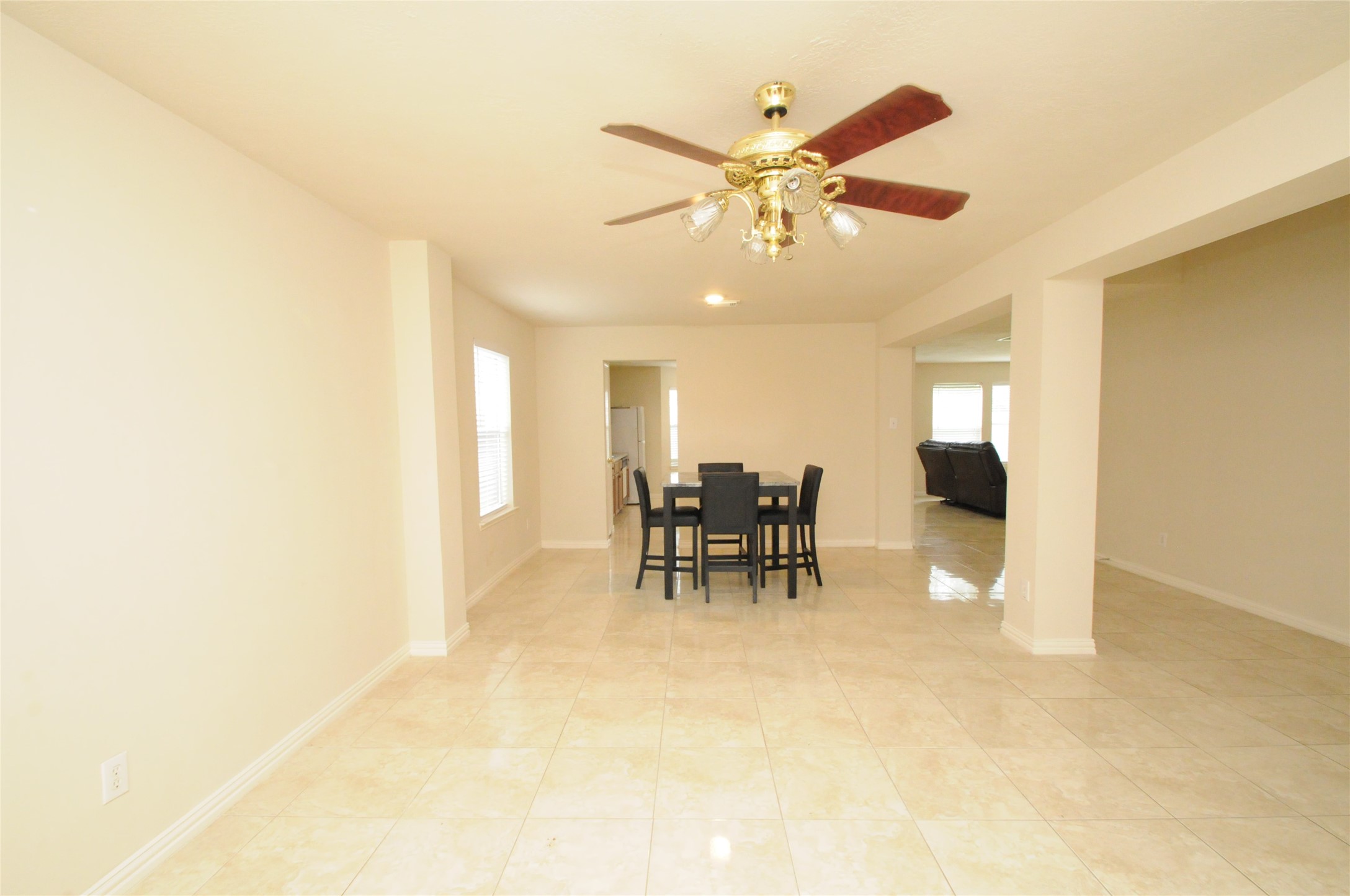 16127 Eaglewood Spring Court Houston, TX 77083 - Photo 6 of 31 a view of a livingroom with furniture and a chandelier