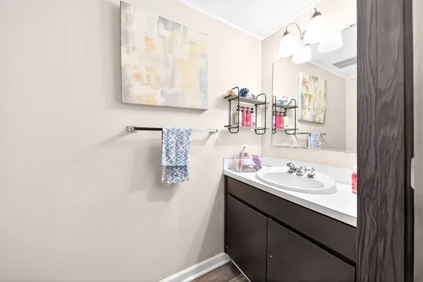 a bathroom with a toilet and a sink