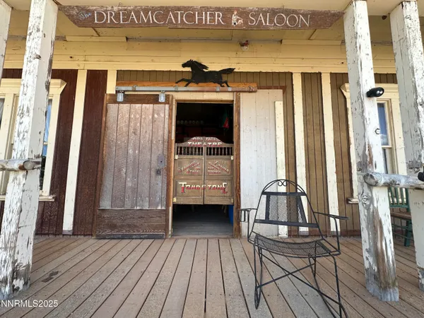 a view of front door with deck