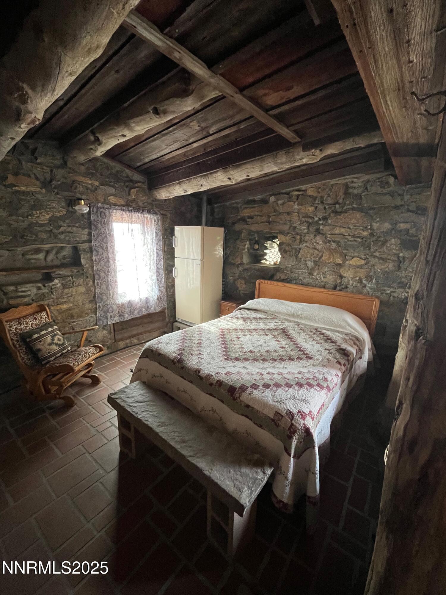 3350 Ikes Cyn Road Round Mountain, NV 89045 - Photo 26 of 38 a dining table sitting chairs in a room