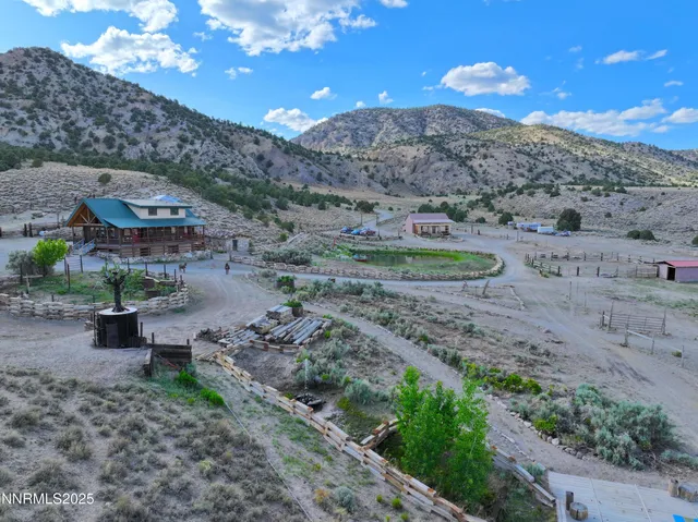 a view of a lake with mountains in the background