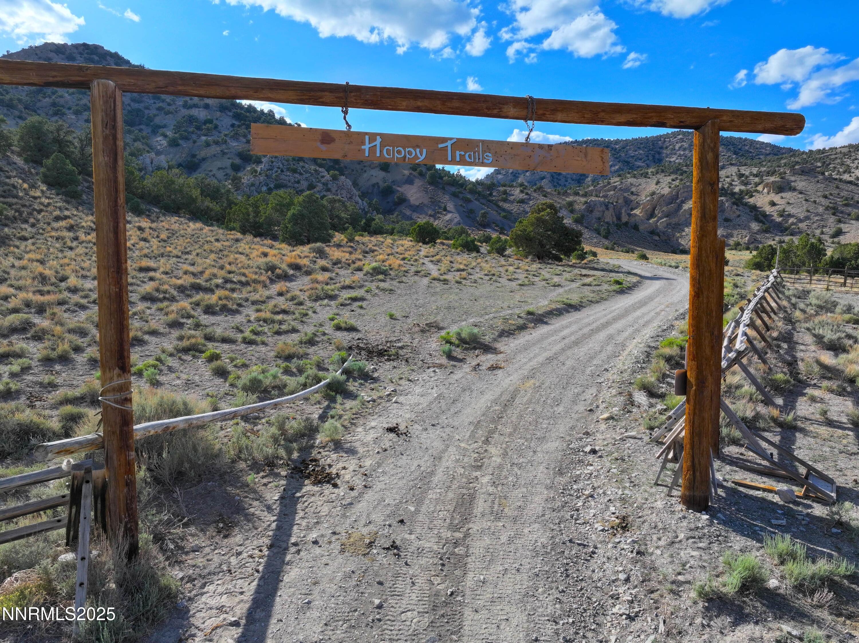 3350 Ikes Cyn Road Round Mountain, NV 89045 - Photo 34 of 38 a view of a backyard of the house