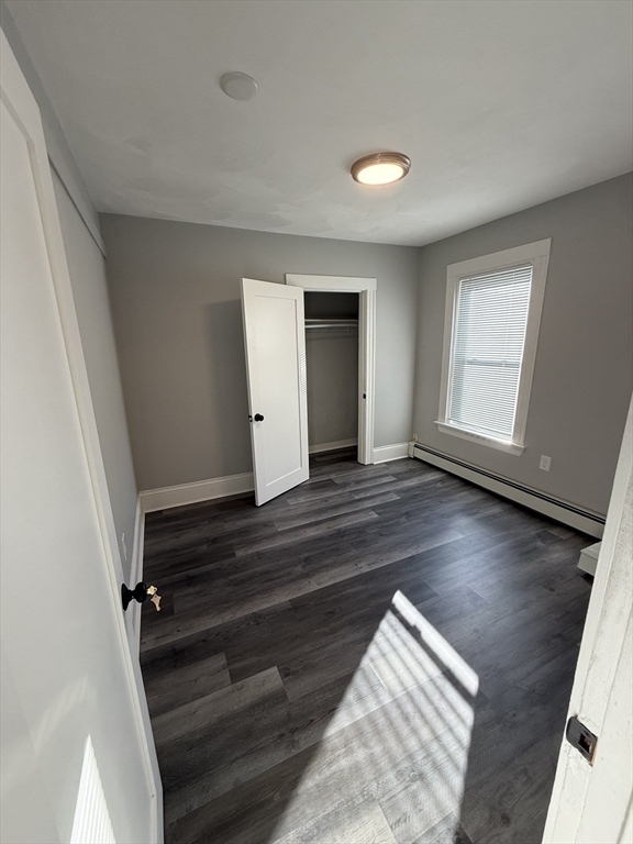 1922 Columbus Avenue, Unit 3 Boston, MA 02119 - Photo 16 of 22 a view of entryway with wooden floor