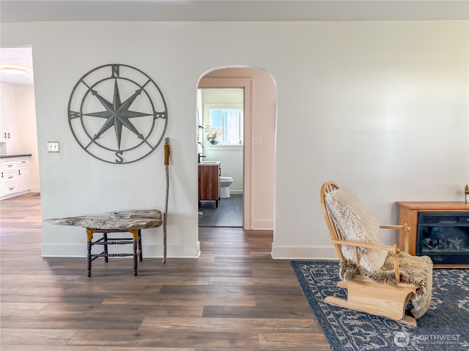 2640 Queets Avenue Hoquiam, WA 98550 - Photo 11 of 28 a living room with furniture a fireplace and a table