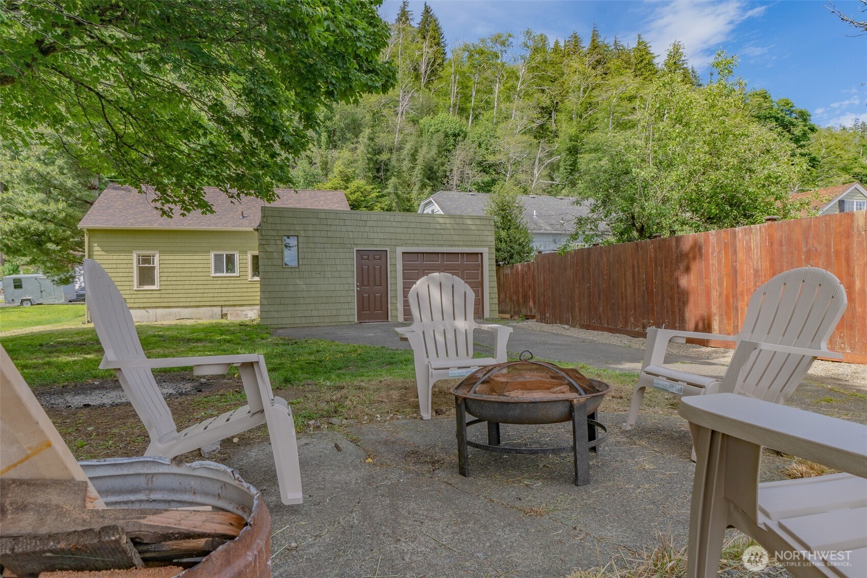 2640 Queets Avenue Hoquiam, WA 98550 - Photo 21 of 28 a view of backyard with seating space and trees