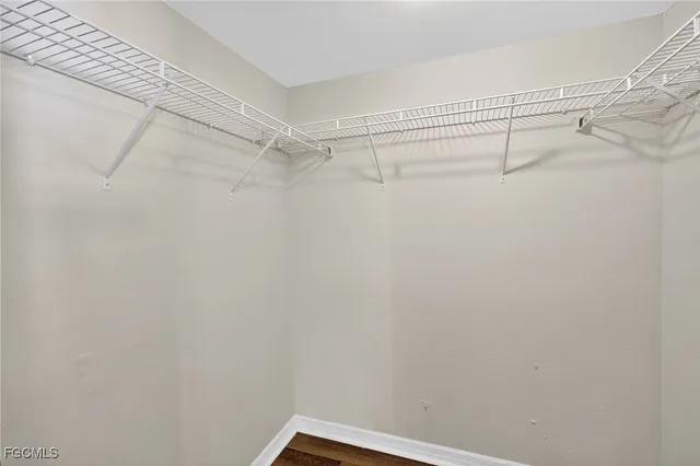 a view of a room with racks on the wall