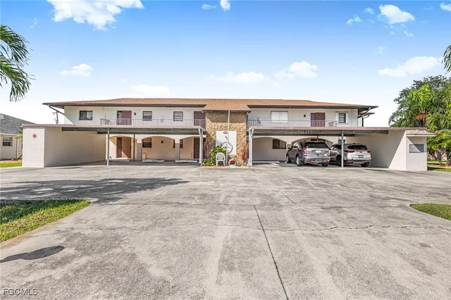 a view of a car parked in front of a building
