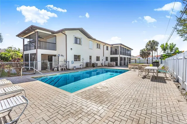 a view of a house with swimming pool