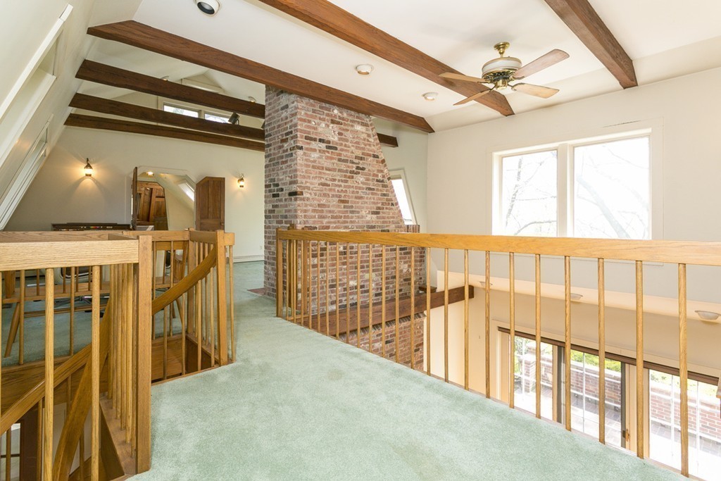 25 Rutledge Road Natick, MA 01760 - Photo 21 of 30 a view of a hallway with wooden floor