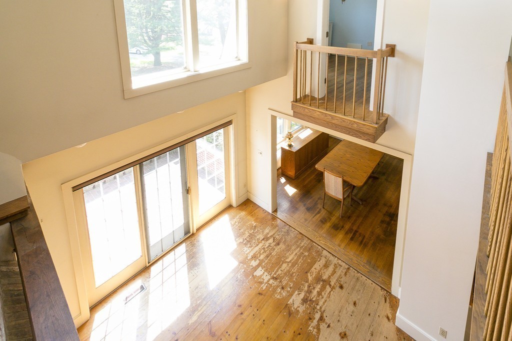 25 Rutledge Road Natick, MA 01760 - Photo 22 of 30 a view of an entryway with wooden floor and door