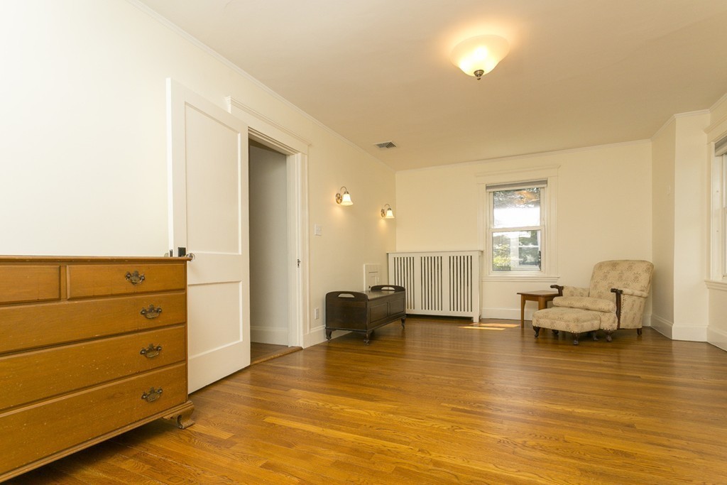 25 Rutledge Road Natick, MA 01760 - Photo 25 of 30 a living room with furniture and wooden floor
