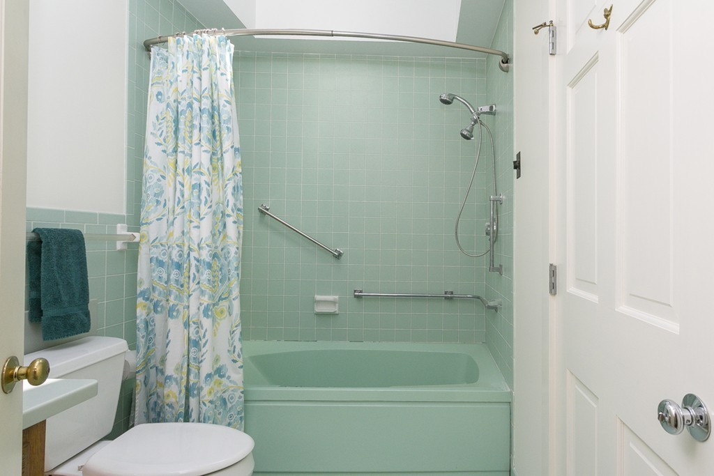 25 Rutledge Road Natick, MA 01760 - Photo 26 of 30 a bathroom with a shower a toilet and a sink