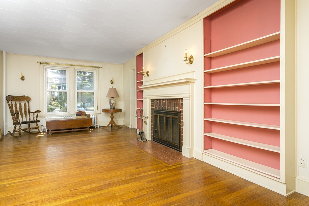 25 Rutledge Road Natick, MA 01760 - Photo 4 of 30 a living room with furniture and a fireplace