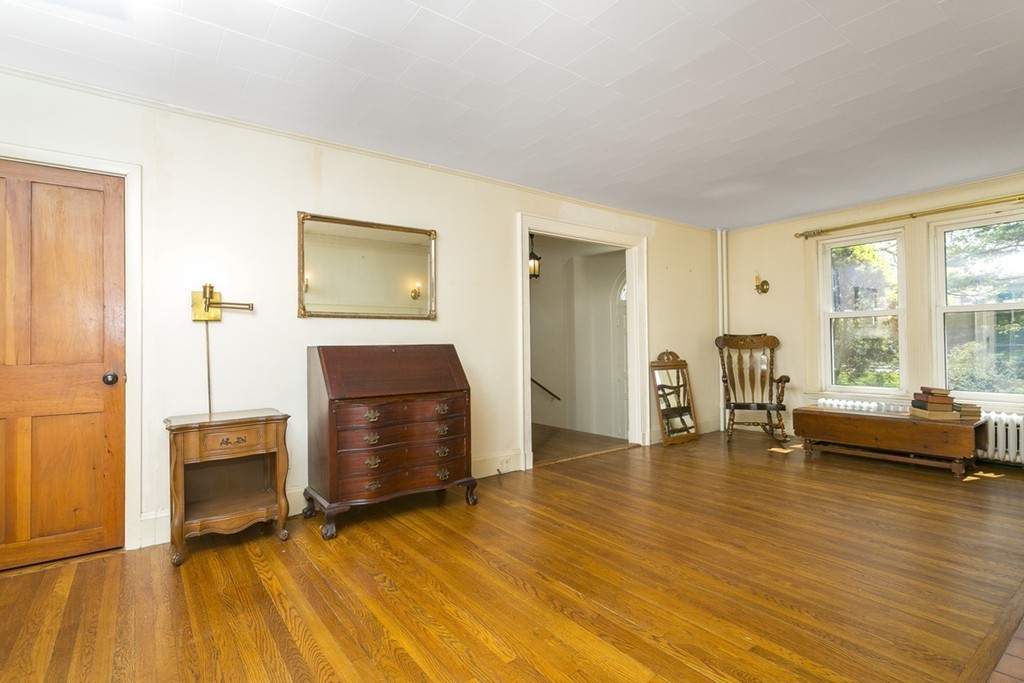 25 Rutledge Road Natick, MA 01760 - Photo 5 of 30 a living room with furniture and a fireplace