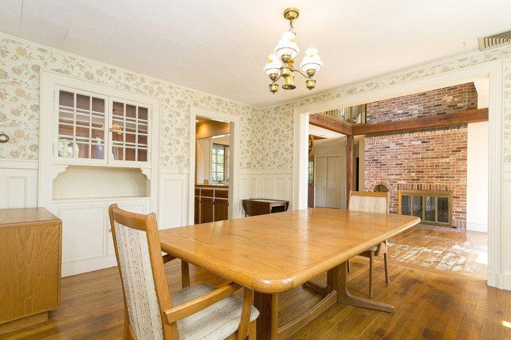 25 Rutledge Road Natick, MA 01760 - Photo 7 of 30 a view of a dining room with furniture and wooden floor