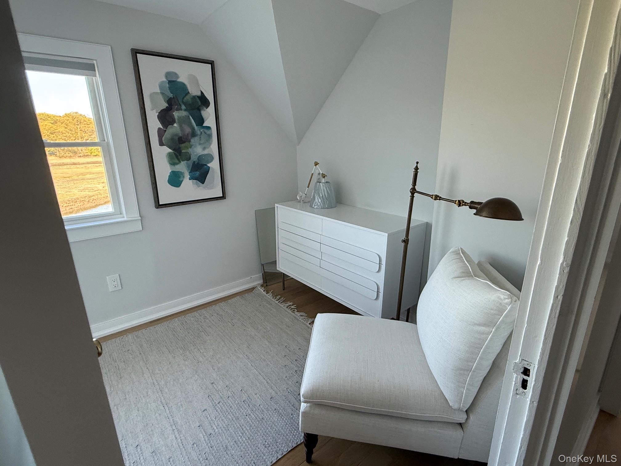 329 Centre Island Road Centre Island, NY 11771 - Photo 23 of 28 a view of livingroom with furniture and a window