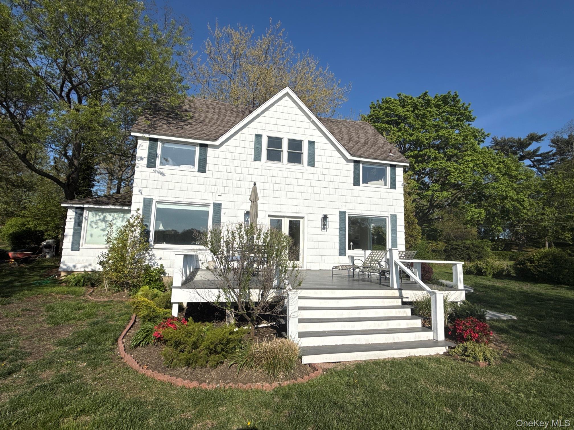 329 Centre Island Road Centre Island, NY 11771 - Photo 28 of 28 a front view of a house with a yard