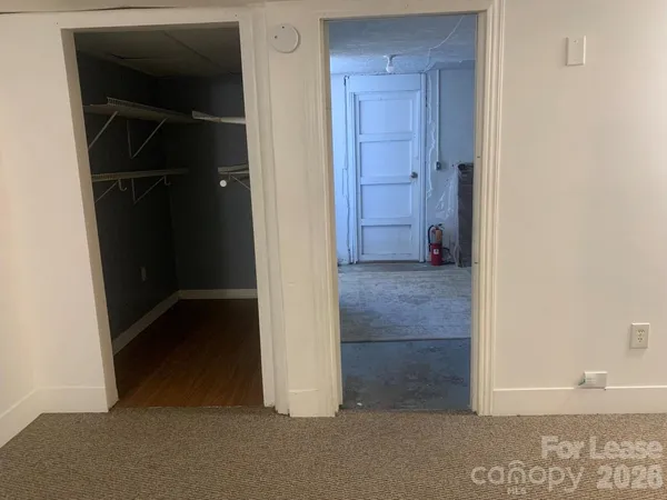 a room with a chair and a table