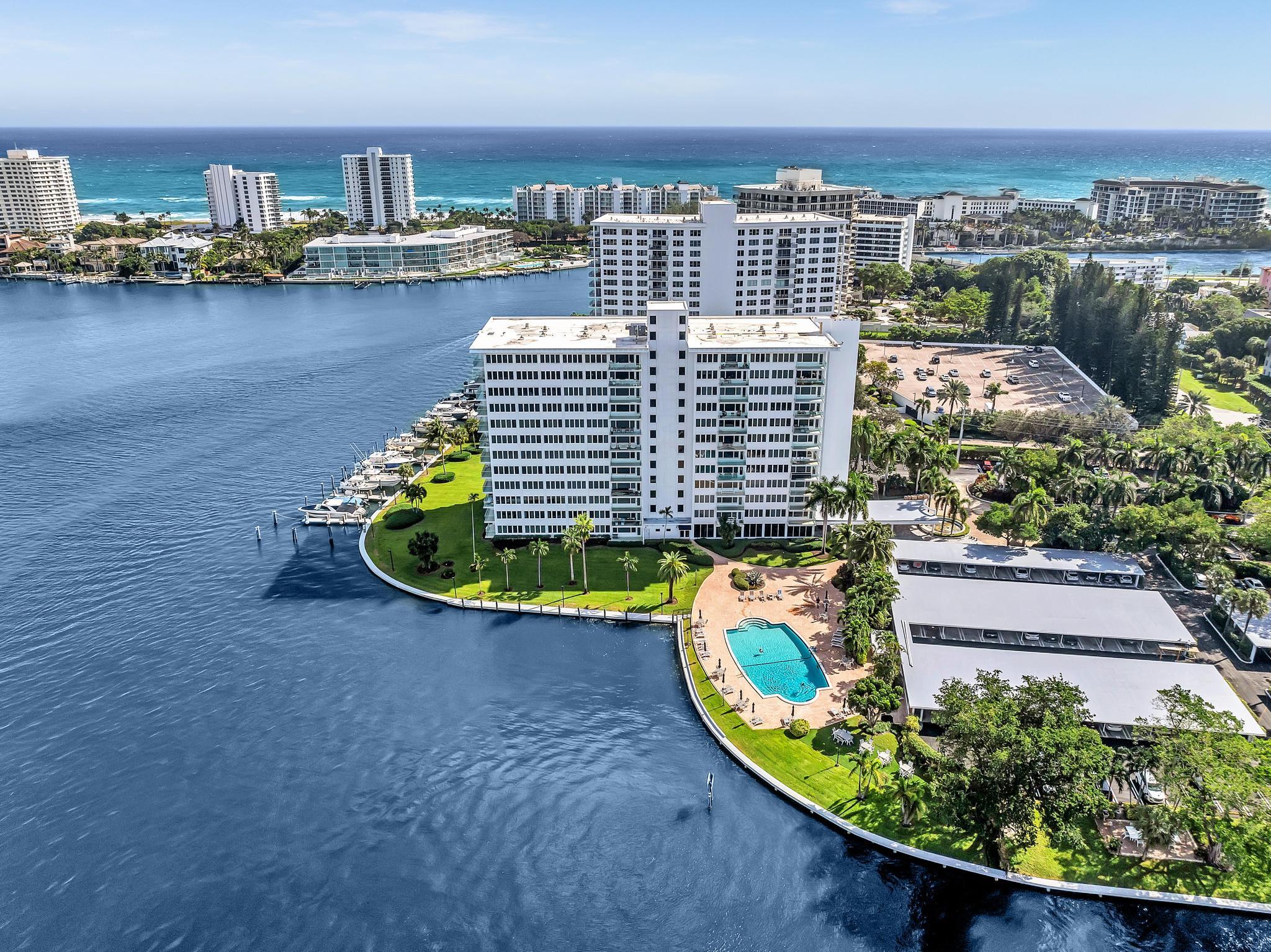 701 East Camino Real, Unit 12G Boca Raton, FL 33432 - Photo 68 of 82 a view of a swimming pool with outdoor seating space