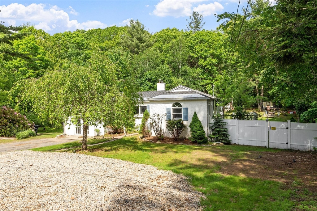 144 Bailey Road Holden, MA 01520 - Photo 2 of 42 a front view of a house with a yard