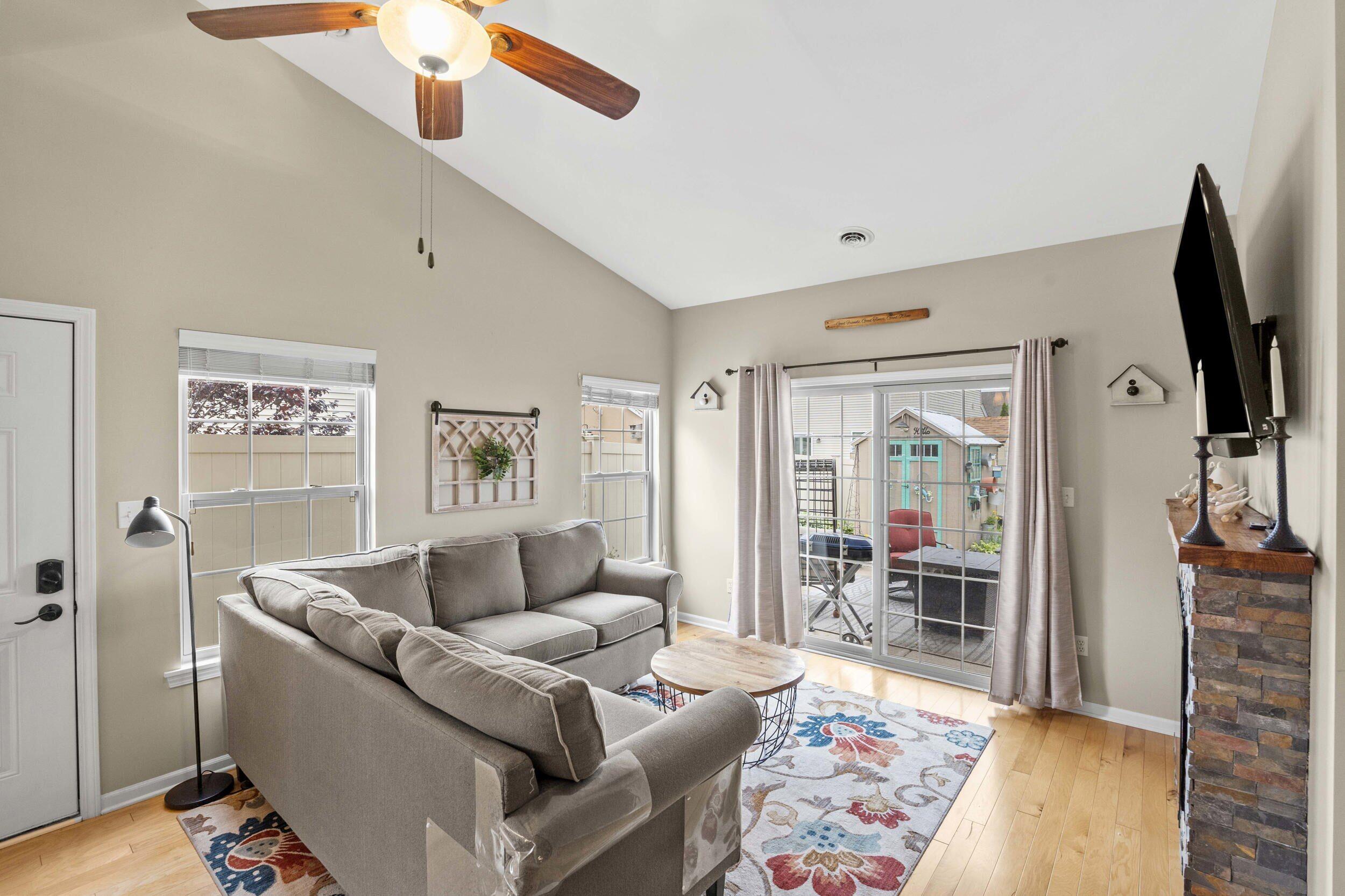 548 Aster Lane Griffith, IN 46319 - Photo 3 of 20 a living room with furniture and a flat screen tv