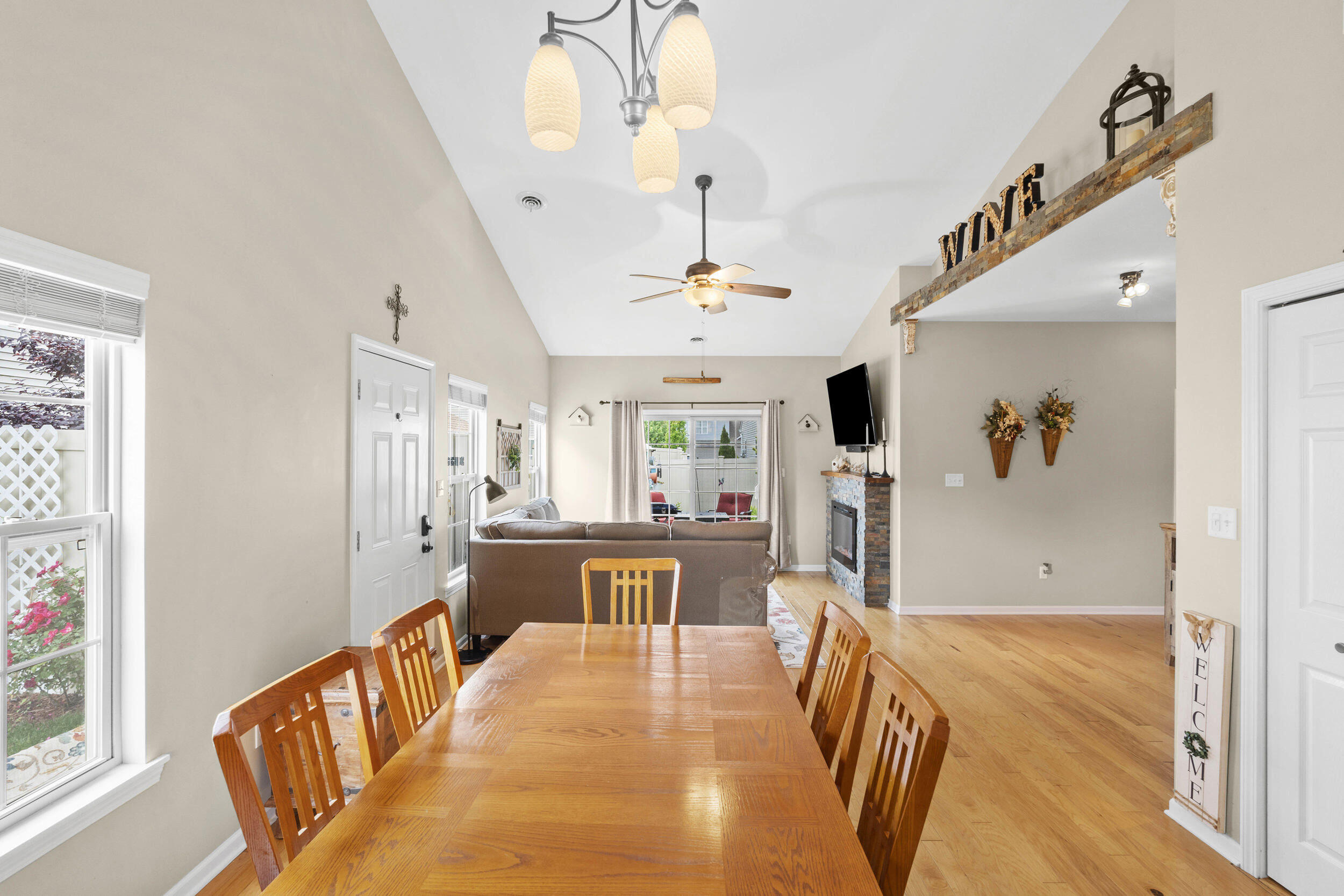 548 Aster Lane Griffith, IN 46319 - Photo 9 of 20 a view of a hallway with furniture and chandelier