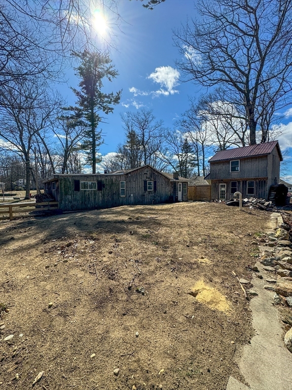 15 Wood Path Ashburnham, MA 01430 - Photo 11 of 12 a view of a yard with a house