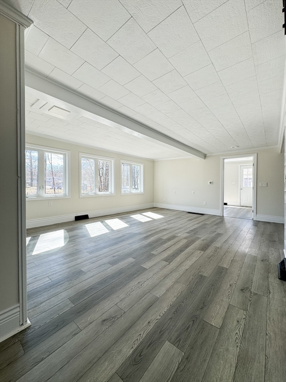 15 Wood Path Ashburnham, MA 01430 - Photo 2 of 12 an empty room with wooden floor and windows