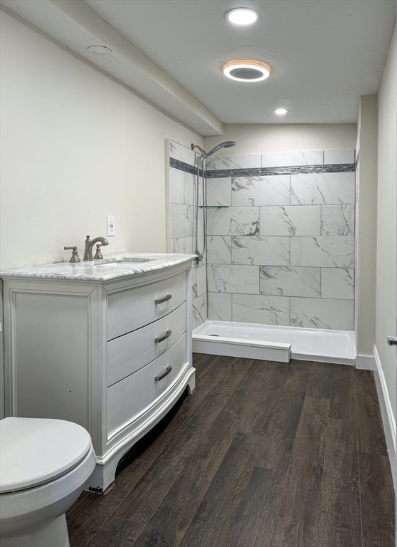 15 Wood Path Ashburnham, MA 01430 - Photo 8 of 12 a bathroom with a granite countertop sink toilet and shower